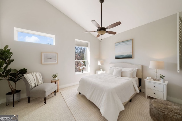 bedroom with baseboards, light colored carpet, a ceiling fan, and vaulted ceiling