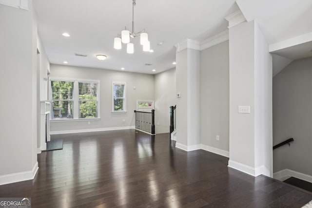 living area with ornamental molding, wood finished floors, recessed lighting, baseboards, and a chandelier