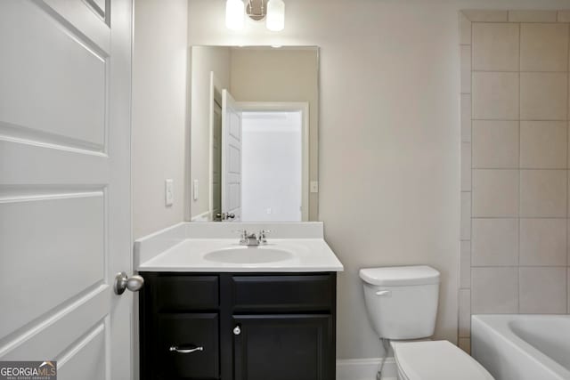 full bathroom featuring toilet and vanity