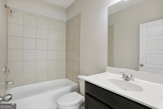 full bath featuring shower / tub combination, toilet, and vanity