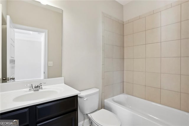 bathroom featuring vanity, toilet, and shower / bath combination