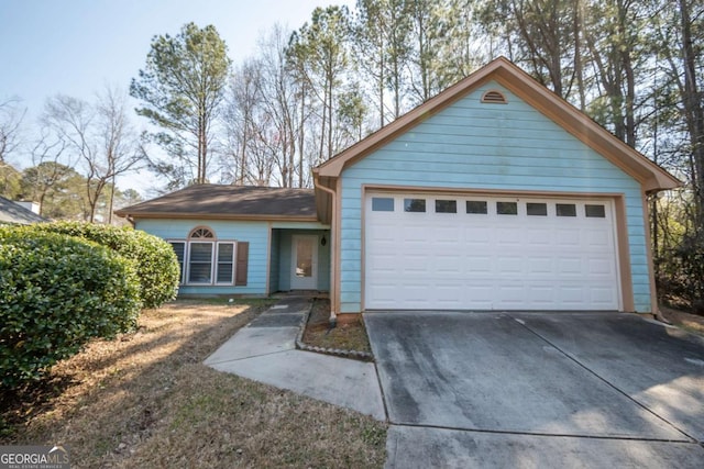 view of front of house with concrete driveway