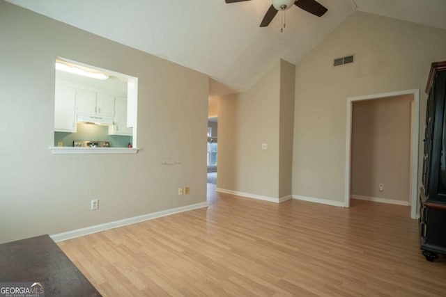 unfurnished living room with visible vents, baseboards, light wood-type flooring, and a ceiling fan