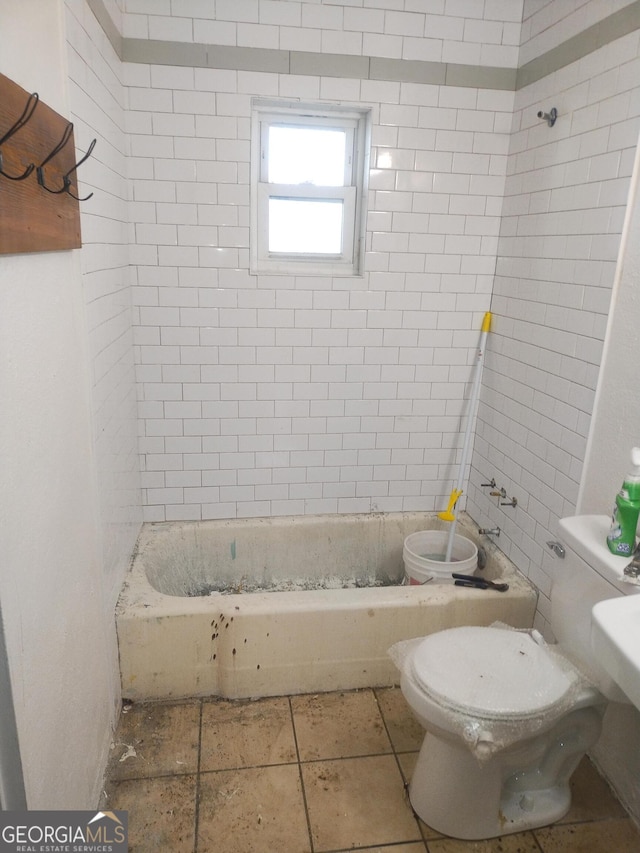 bathroom with shower / tub combination and toilet