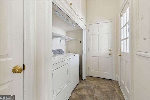 laundry area with separate washer and dryer and laundry area