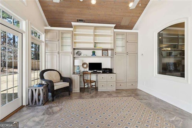 living area with wooden ceiling, lofted ceiling, and ornamental molding