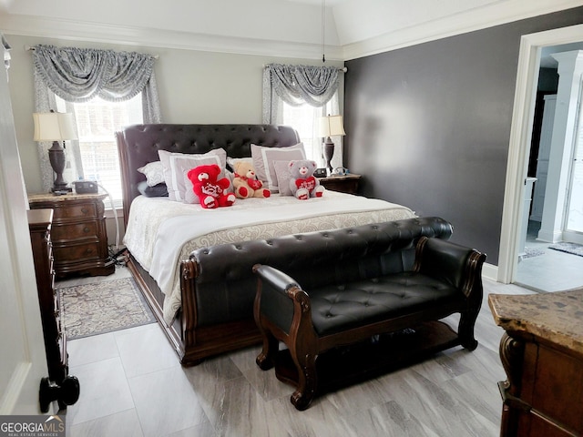 bedroom featuring baseboards and ornamental molding