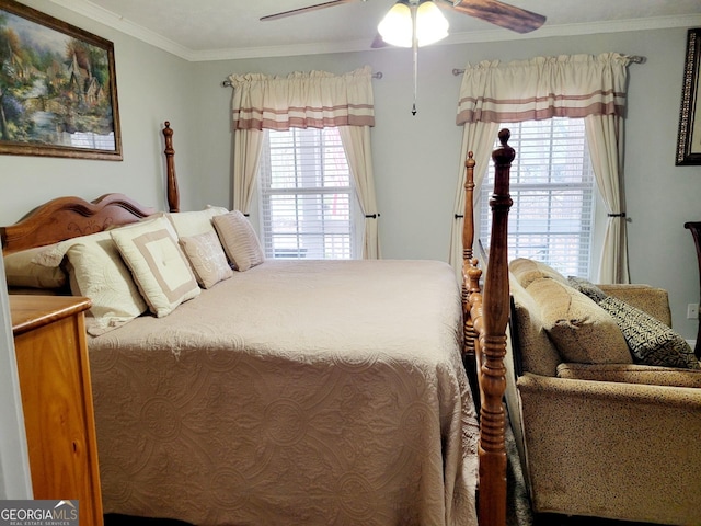 bedroom with a ceiling fan and crown molding