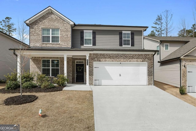 view of front of home with brick siding, concrete driveway, and a garage