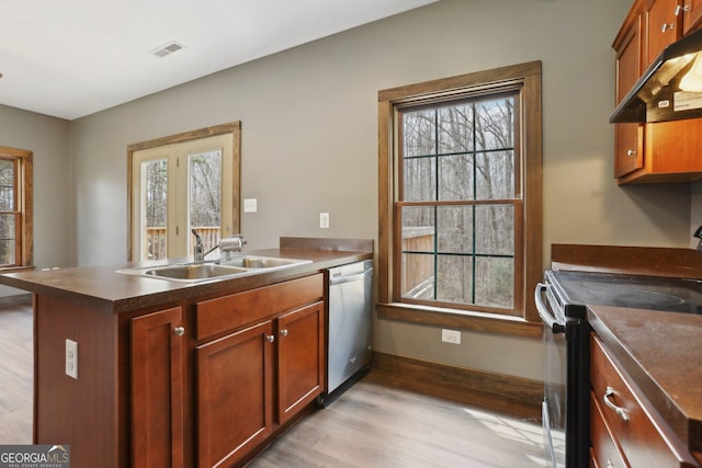 kitchen with a peninsula, a sink, black range with electric stovetop, under cabinet range hood, and dishwasher