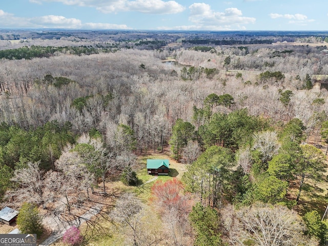 bird's eye view with a forest view