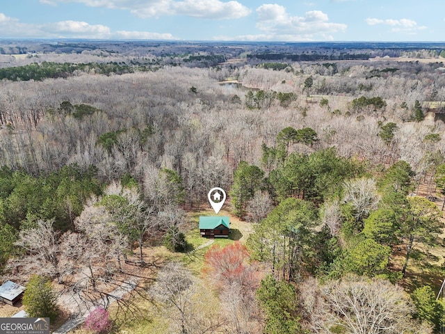 bird's eye view featuring a forest view