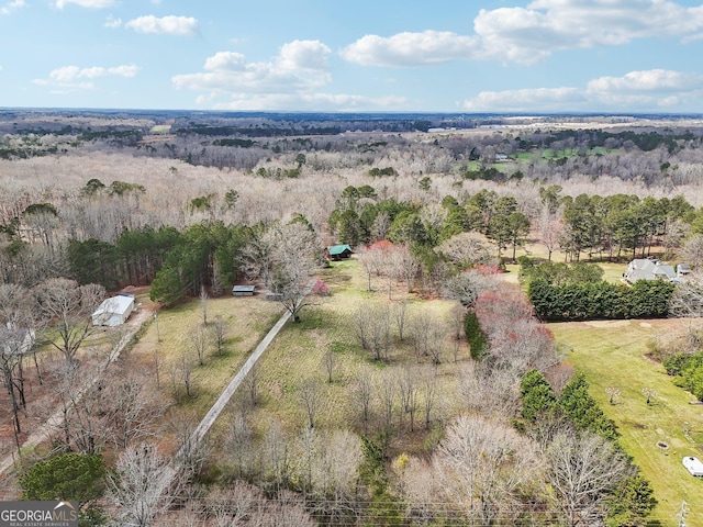 birds eye view of property with a rural view