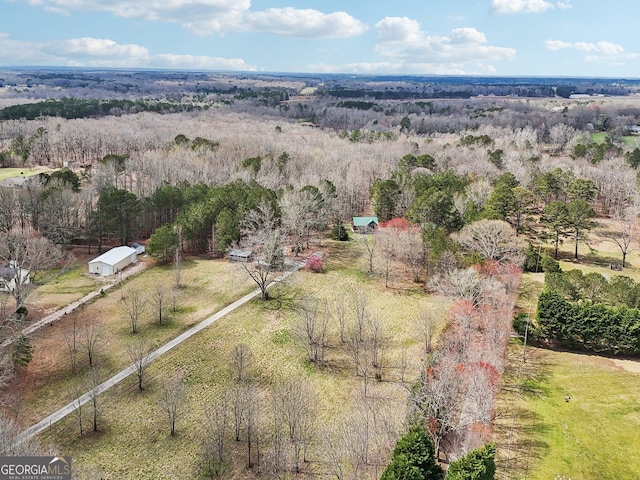 drone / aerial view with a rural view and a forest view