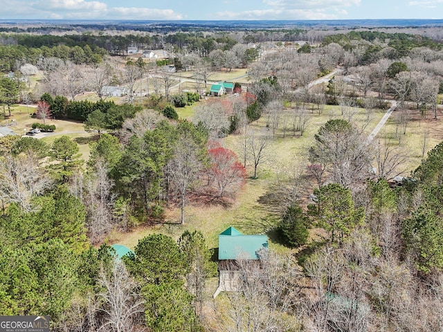 aerial view featuring a forest view