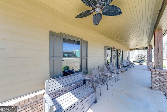 view of patio featuring covered porch and a ceiling fan