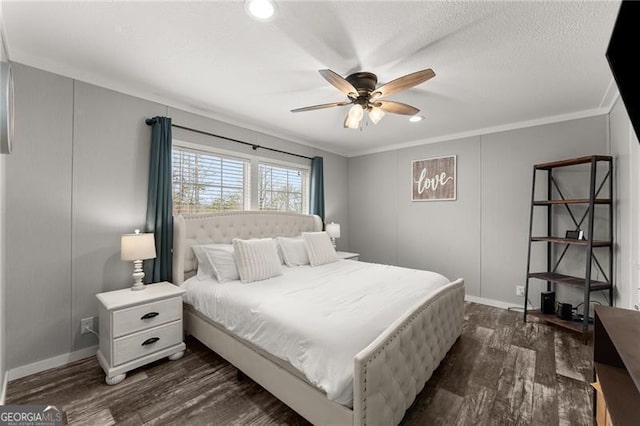 bedroom with baseboards, dark wood-style flooring, and ornamental molding