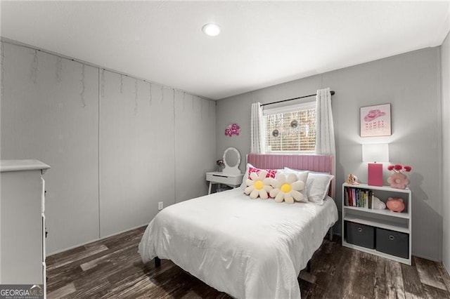 bedroom featuring wood finished floors