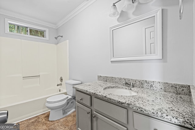 full bath with vanity, crown molding, toilet, and bathing tub / shower combination