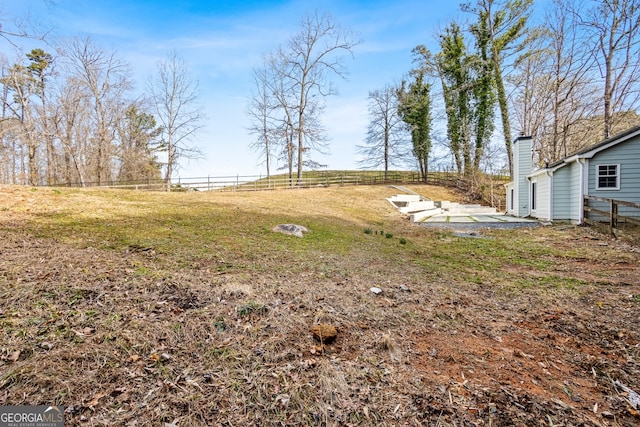 view of yard with fence