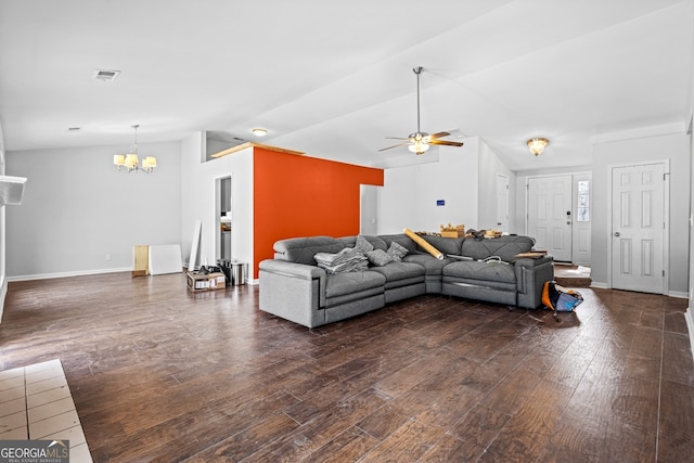 living room with visible vents, dark wood-style floors, vaulted ceiling, and ceiling fan with notable chandelier