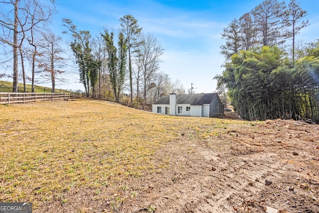 view of yard featuring fence