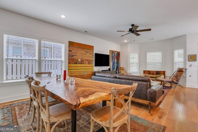 dining area featuring baseboards, recessed lighting, light wood-type flooring, and ceiling fan