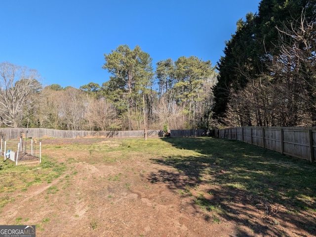 view of yard featuring a fenced backyard