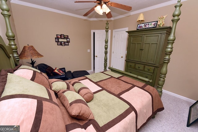 carpeted bedroom with a ceiling fan, crown molding, and baseboards