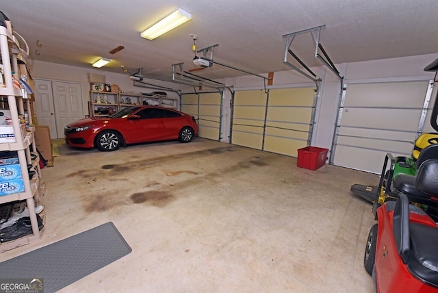 garage featuring a garage door opener