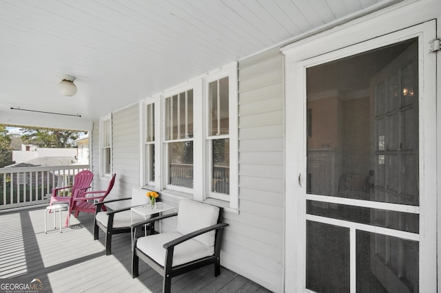 deck featuring covered porch