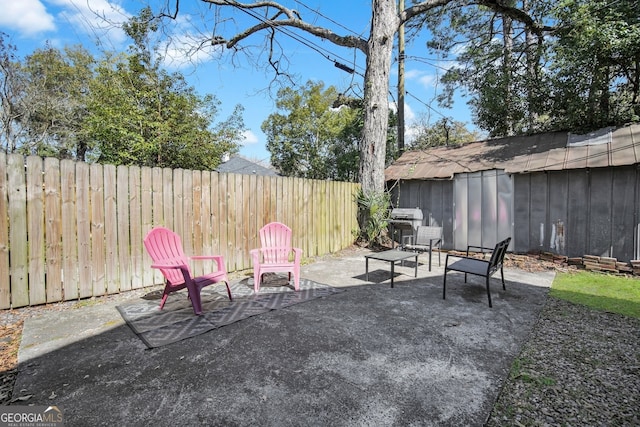 view of patio featuring a fenced backyard