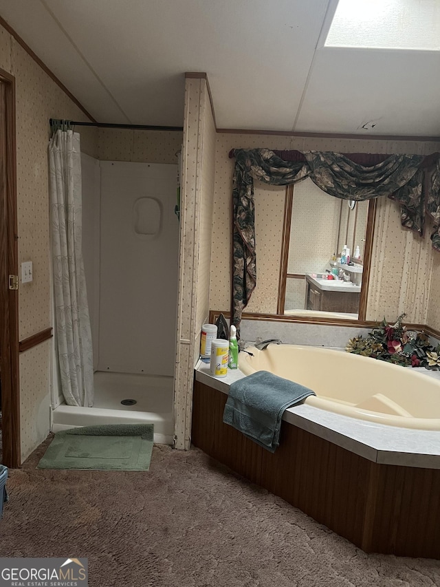 1357 Edgewood Ave, Douglas, GA 31533 - bathroom with a shower stall, wallpapered walls, a bath, and vaulted ceiling