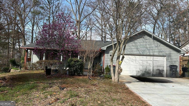 single story home featuring a porch and driveway