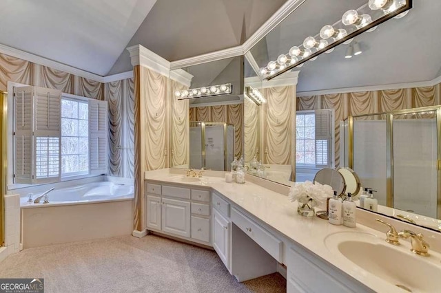 full bathroom with vaulted ceiling, double vanity, a shower stall, and a sink