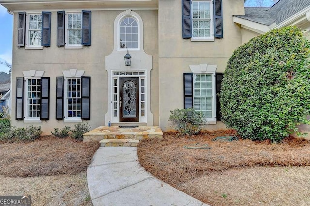 view of front facade featuring stucco siding