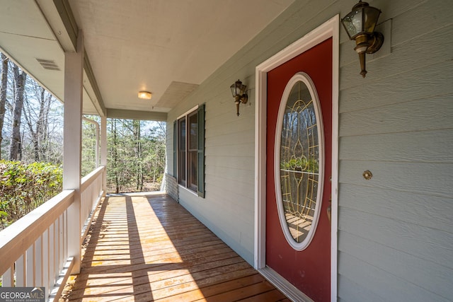 wooden deck with covered porch