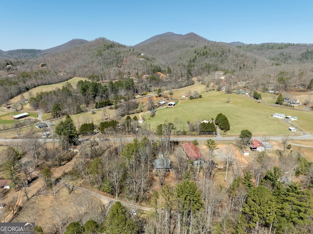 drone / aerial view featuring a mountain view