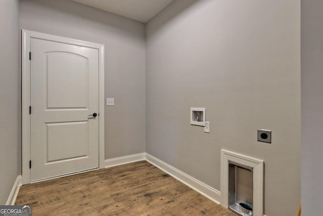 laundry area featuring hookup for a washing machine, wood finished floors, baseboards, hookup for an electric dryer, and laundry area