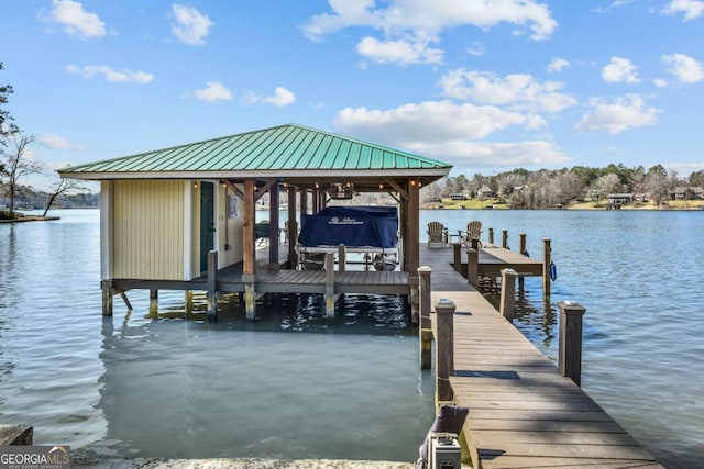 dock area featuring a water view and boat lift