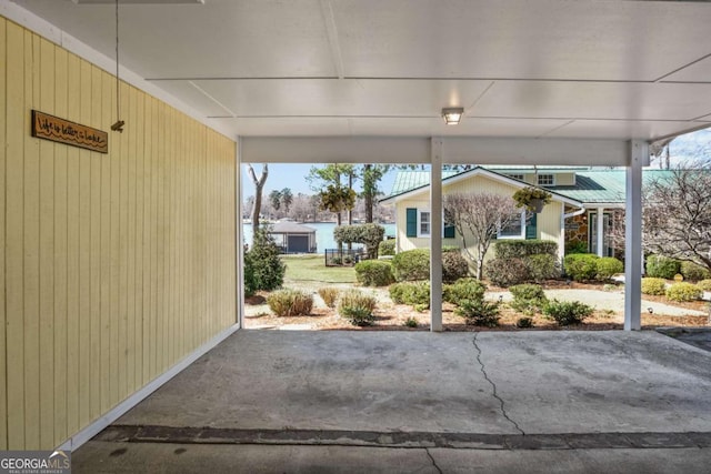 view of patio featuring an attached carport