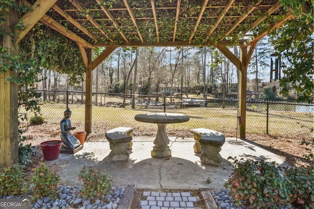 view of yard with a patio area, a pergola, and fence