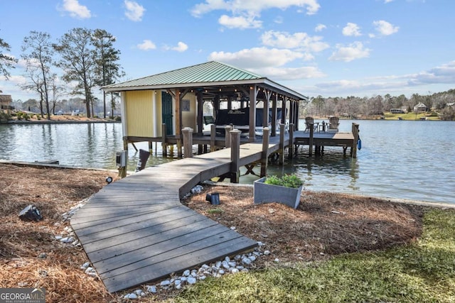 dock area featuring a water view and boat lift