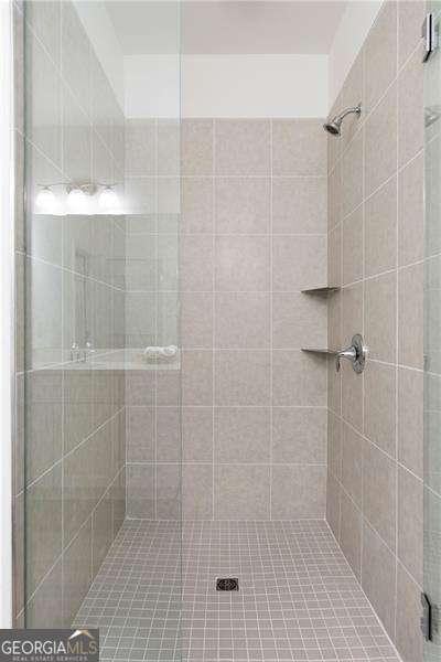 bathroom with a stall shower