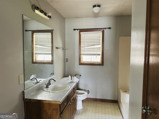 bathroom with visible vents, baseboards, toilet, tile patterned floors, and vanity