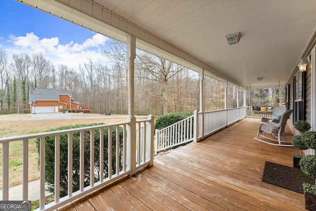 wooden deck featuring a porch