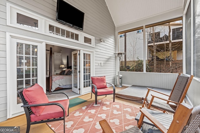 sunroom with french doors and vaulted ceiling