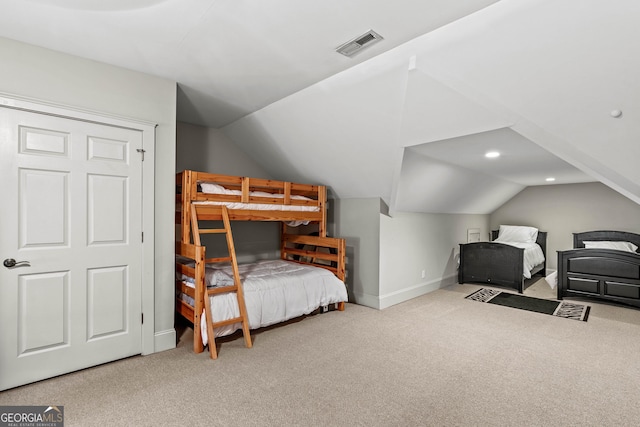 bedroom featuring visible vents, baseboards, lofted ceiling, carpet floors, and recessed lighting