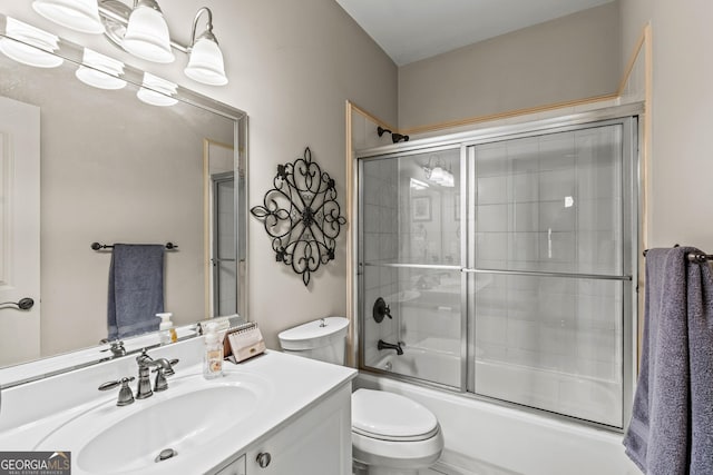 300 Rock Creek Trl, Toccoa, GA 30577 - bathroom featuring toilet, vanity, and bath / shower combo with glass door