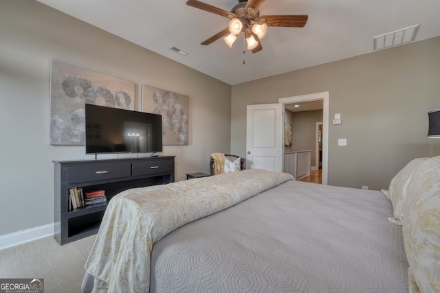 bedroom featuring visible vents, carpet floors, baseboards, and ceiling fan